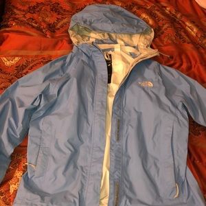 blue north face hooded jacket